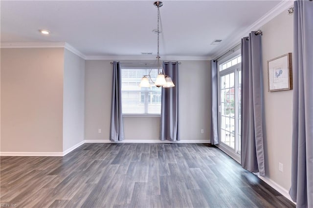 unfurnished dining area with baseboards, dark wood-style flooring, visible vents, and crown molding