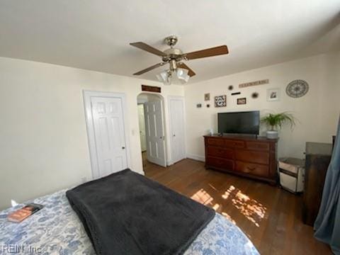 bedroom featuring a ceiling fan and wood finished floors