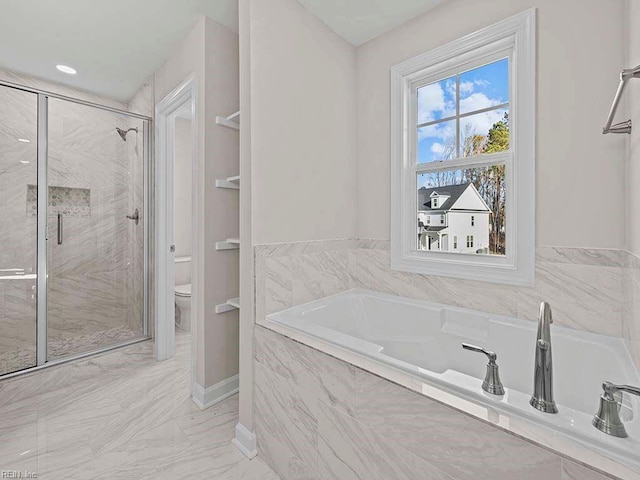 bathroom with marble finish floor, a marble finish shower, toilet, baseboards, and a bath