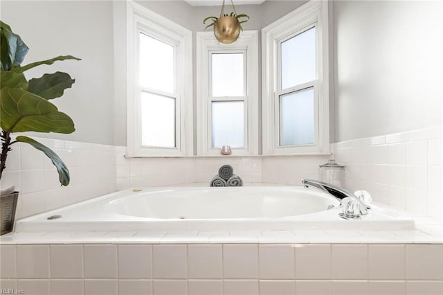 full bathroom with a garden tub