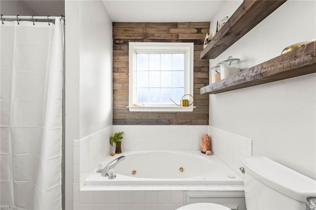 full bath featuring toilet, wood walls, a shower with curtain, and a whirlpool tub