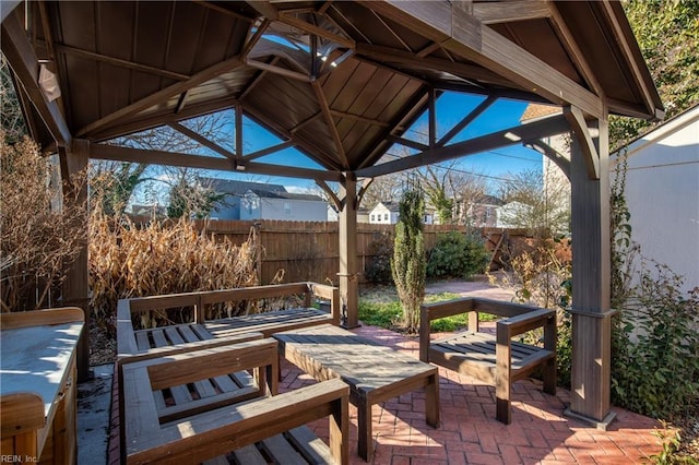 view of patio featuring a gazebo and fence