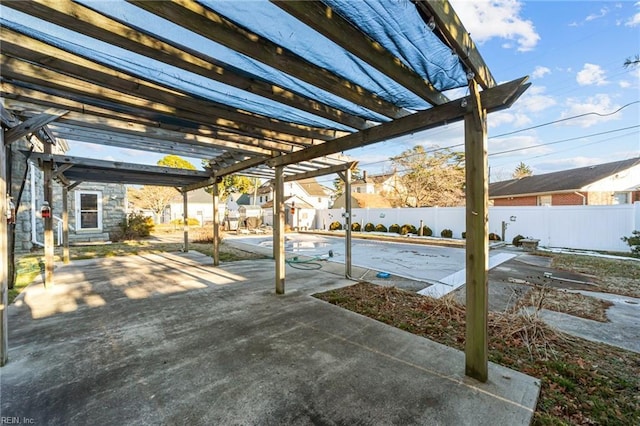 view of patio featuring a fenced backyard and a pergola