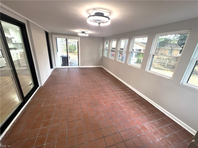 view of unfurnished sunroom