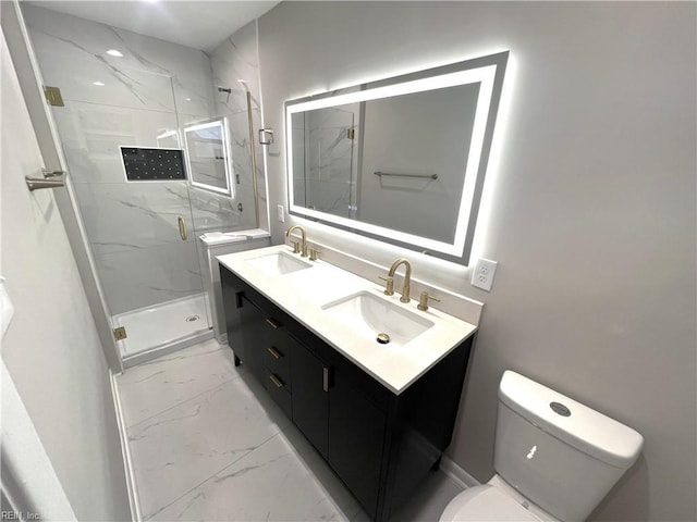 bathroom featuring a marble finish shower, marble finish floor, a sink, and toilet