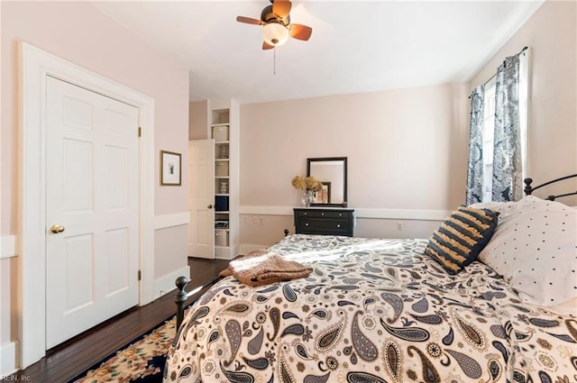 bedroom featuring ceiling fan and wood finished floors