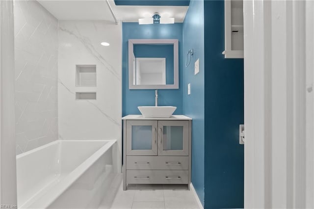 full bathroom with bathing tub / shower combination, tile patterned flooring, and vanity