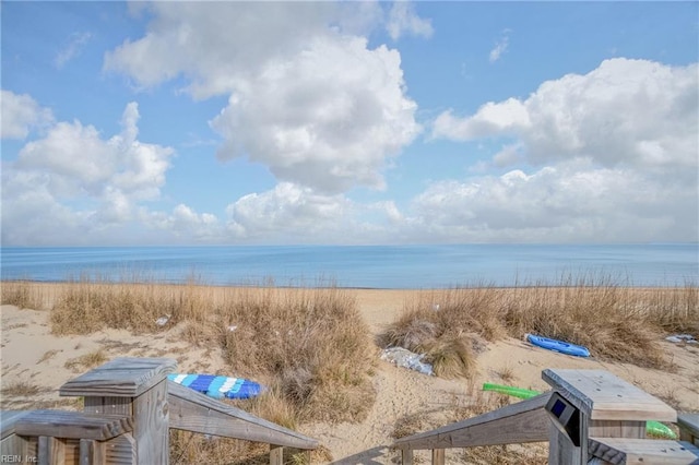 property view of water featuring a beach view