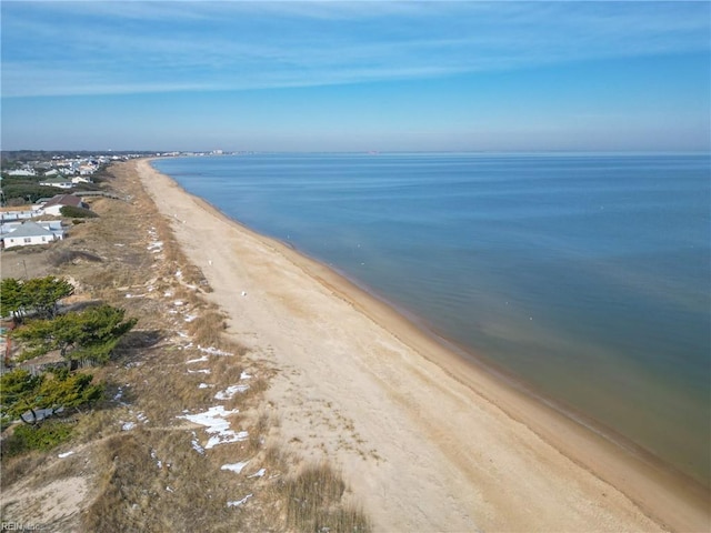 bird's eye view with a beach view and a water view