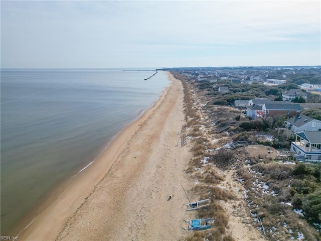 bird's eye view with a view of the beach and a water view