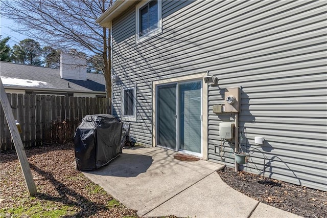 exterior space featuring a patio and fence