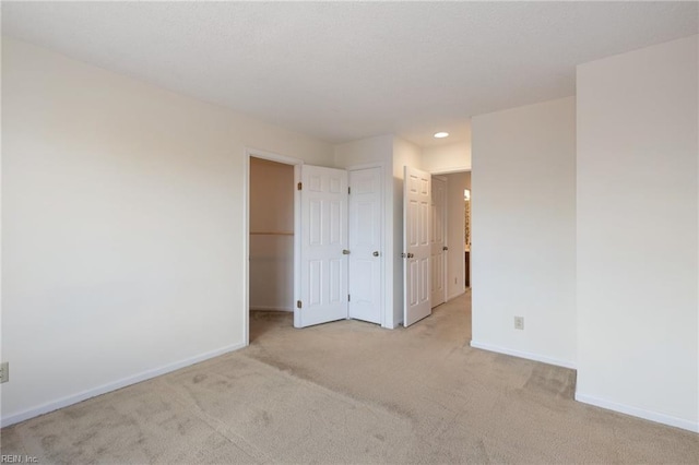 255 College Cross Rd Unit 89, Norfolk, VA 23510 - carpeted empty room with baseboards and recessed lighting
