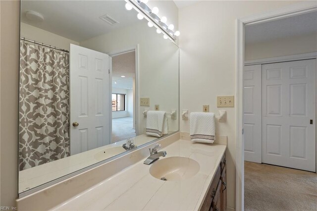 255 College Cross Rd Unit 89, Norfolk, VA 23510 - bathroom with visible vents and vanity