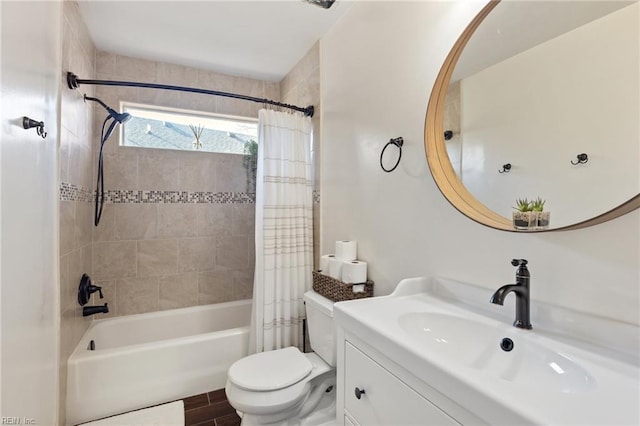 bathroom featuring shower / tub combo, vanity, and toilet