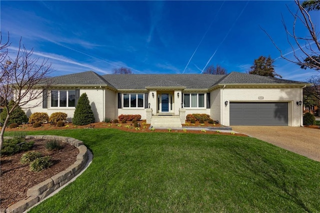 ranch-style house featuring driveway, a shingled roof, an attached garage, a front lawn, and brick siding