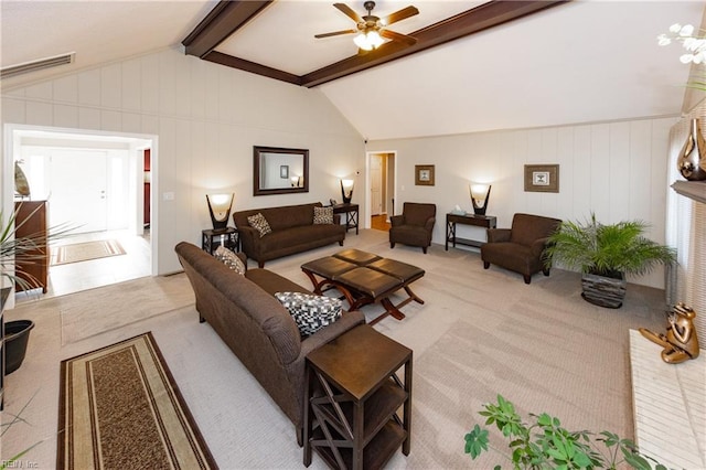 carpeted living area featuring lofted ceiling with beams, visible vents, and a ceiling fan