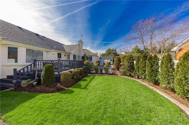 view of yard featuring a deck