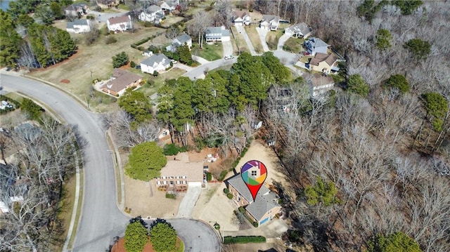 birds eye view of property with a residential view