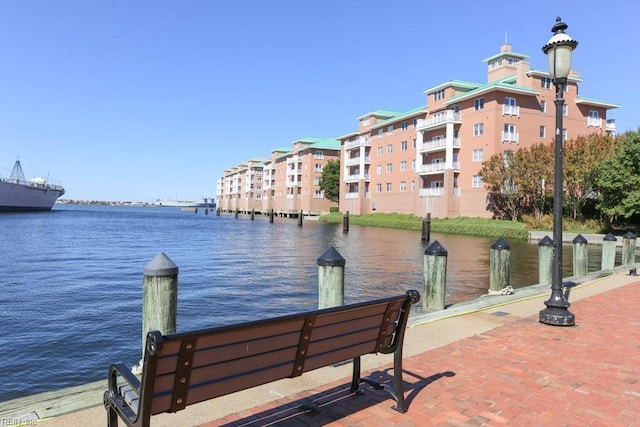 exterior space with a water view