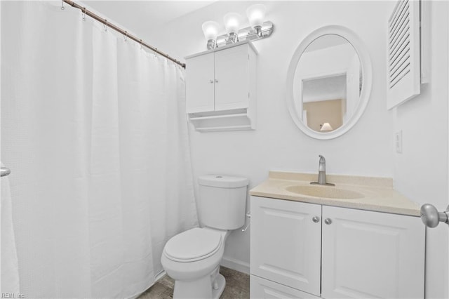 full bath with toilet and vanity