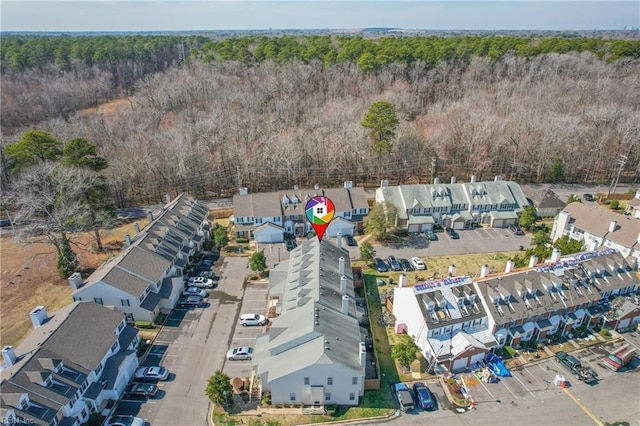 bird's eye view with a residential view and a view of trees