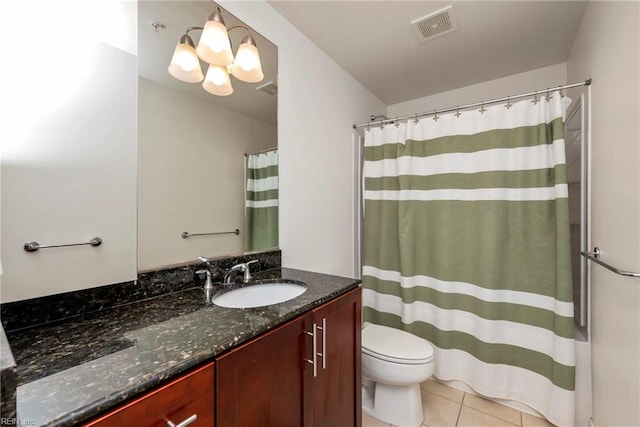 full bathroom featuring toilet, vanity, visible vents, tile patterned floors, and an inviting chandelier