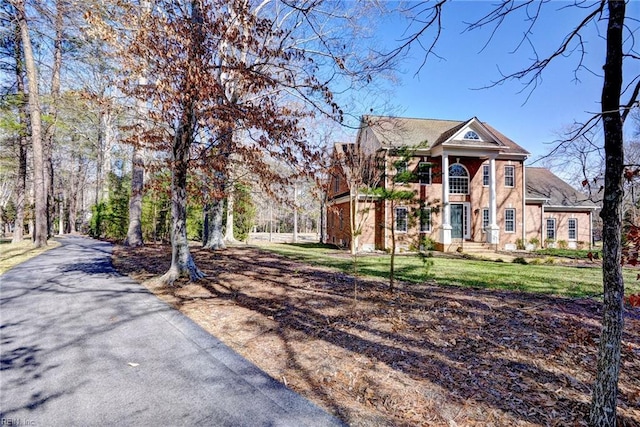 view of front of property with a front lawn