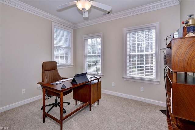 home office with light carpet, ceiling fan, crown molding, and baseboards