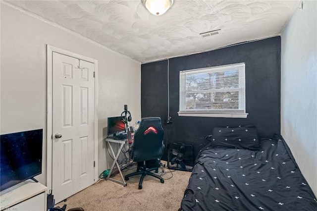 carpeted bedroom with visible vents