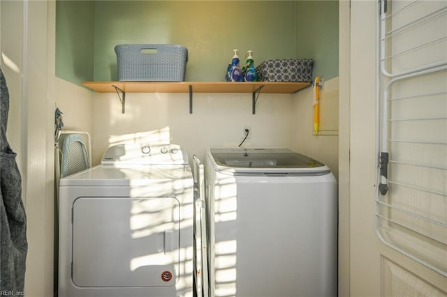 laundry room featuring laundry area and independent washer and dryer