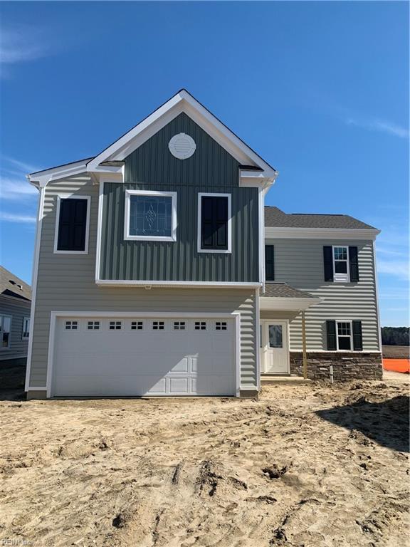 view of front facade featuring a garage and board and batten siding