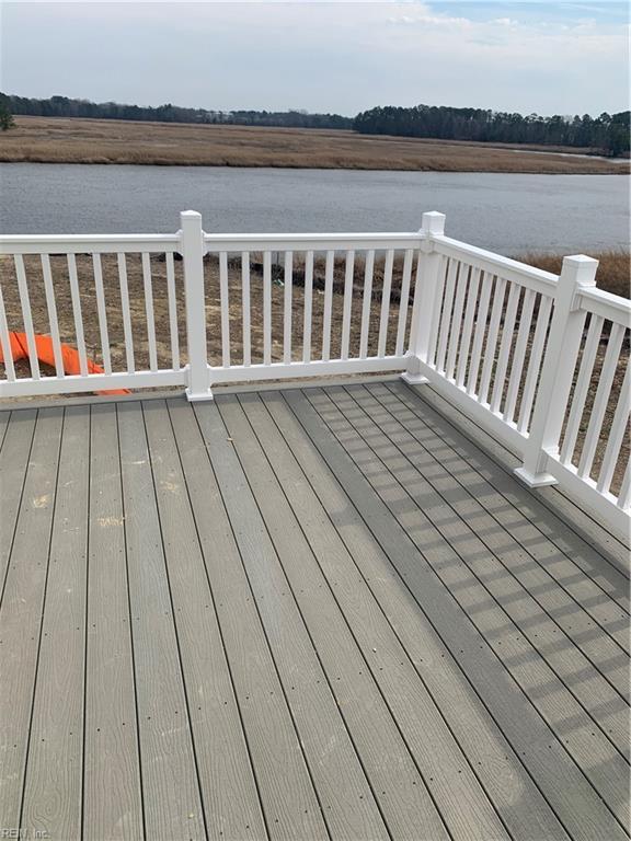 wooden terrace with a water view