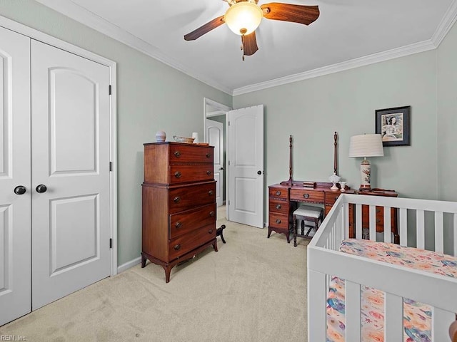 bedroom with a ceiling fan, light colored carpet, and crown molding