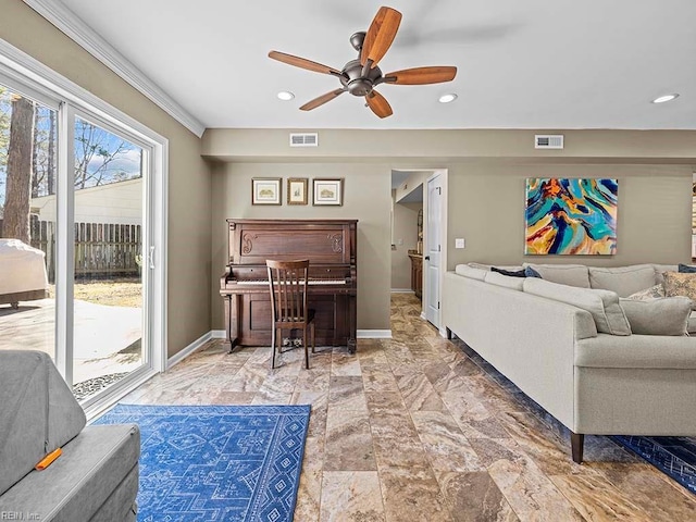 living room with recessed lighting, visible vents, and baseboards