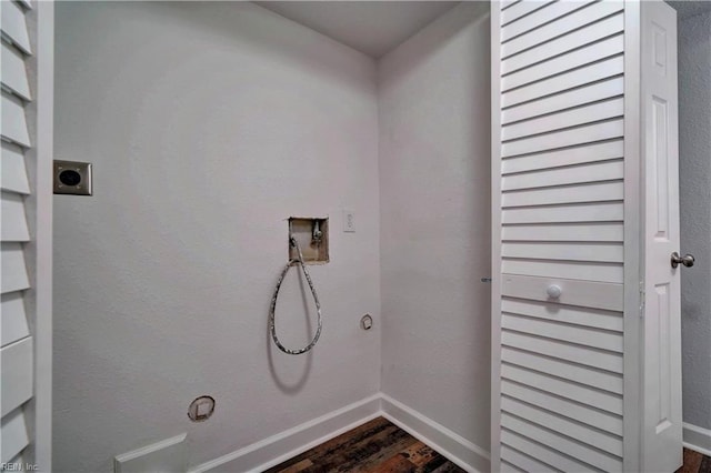 laundry area featuring hookup for a gas dryer, washer hookup, hookup for an electric dryer, and baseboards