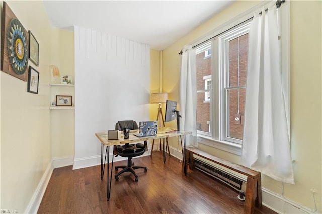 office area featuring wood finished floors and baseboards