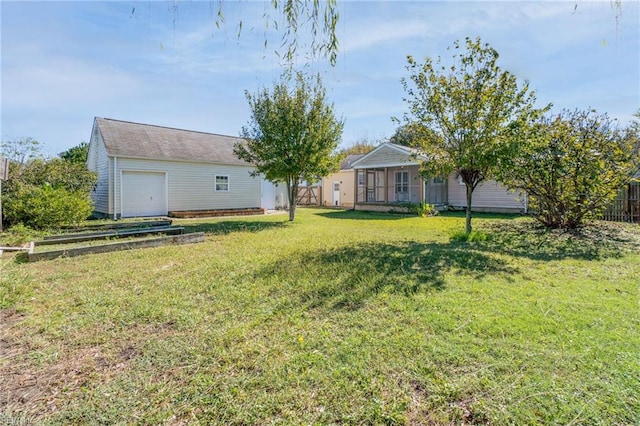 view of yard featuring a garage