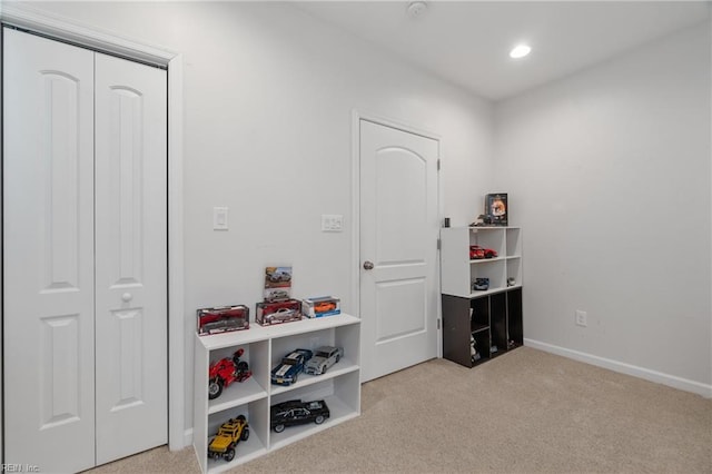 interior space featuring baseboards, carpet floors, and recessed lighting