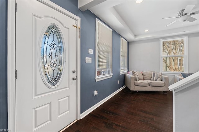 foyer entrance featuring a ceiling fan, baseboards, dark wood-style flooring, and recessed lighting