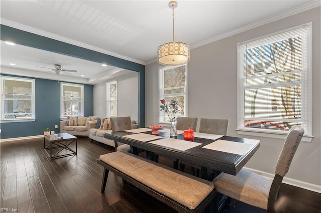 dining room featuring baseboards, dark wood-style flooring, recessed lighting, and crown molding