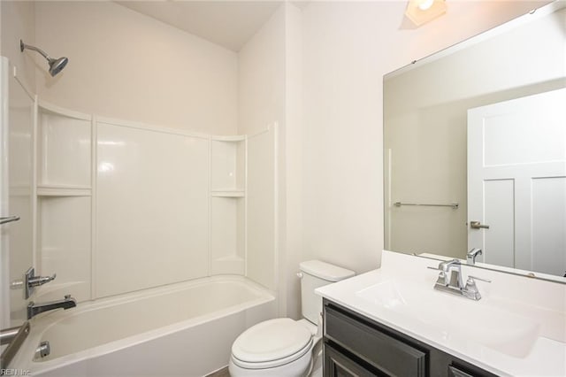 bathroom with  shower combination, vanity, and toilet