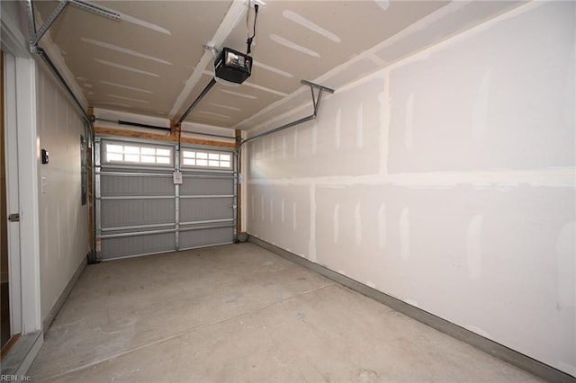 garage featuring a garage door opener