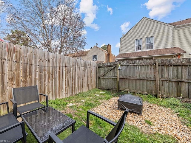 view of yard with a fenced backyard