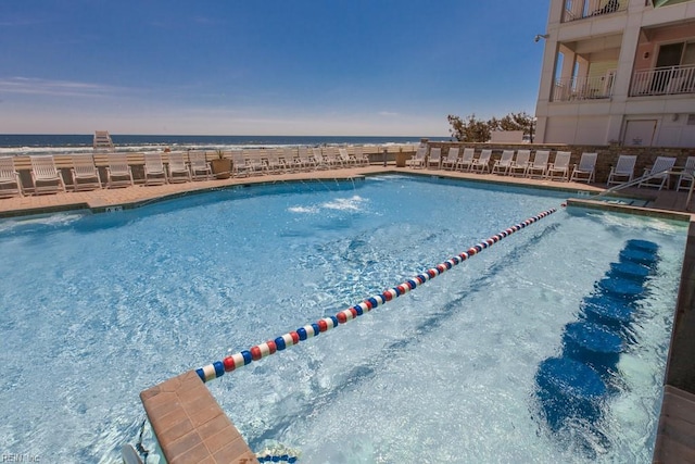 pool featuring a water view