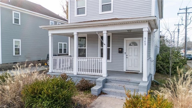 property entrance featuring a porch