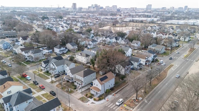 birds eye view of property with a residential view