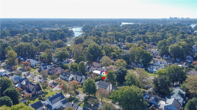 birds eye view of property with a residential view