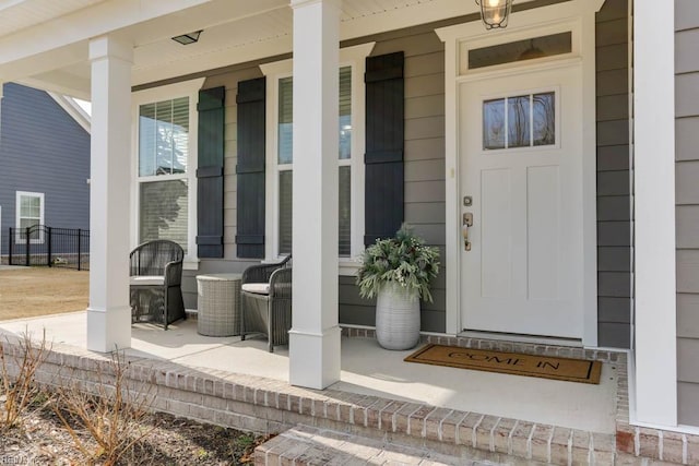 entrance to property with a porch