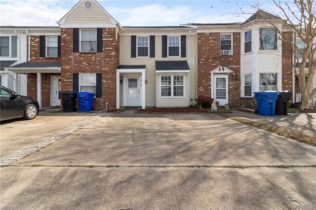 multi unit property featuring brick siding