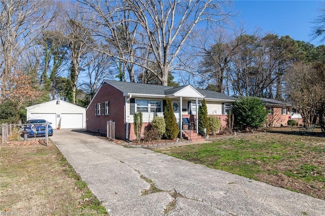 single story home featuring a garage, an outbuilding, fence, a front lawn, and brick siding